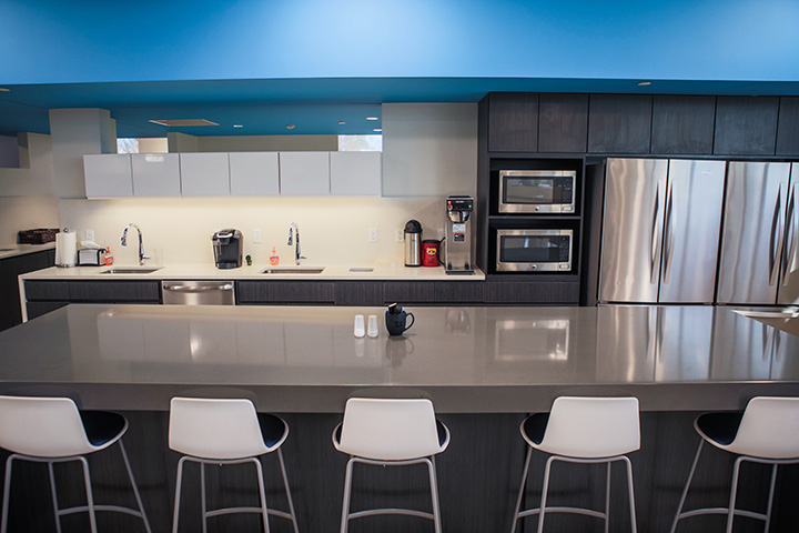 kitchenette with custom cabinetry