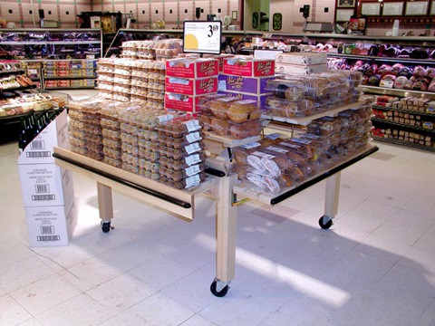 multi-level tilt merchandiser
